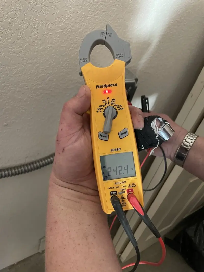 Voltage testing with clamp meter during Ceiling Fan Installation in Colchester